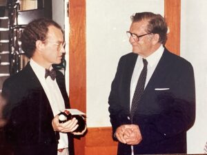 Craig Boaden makes presentation to ACL Patron Morris West at ACL Official Opening 28 Oct 1983