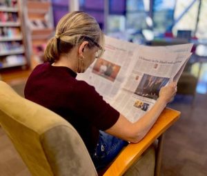 woman reading paper (1)